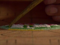 MS Monk carefully laying down and  sand following  pattern of  mandala  / Kathmandu, Central, Nepal Stock Footage