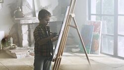 Little boy painting Stock Footage