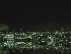View of Industrial district at night from highway Stock Footage