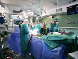 Surgeons in operating room Stock Footage