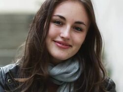 woman looking at the camera and smiling Stock Footage