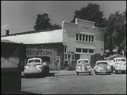 Montage: 1950 Chevy truck hauls salt and grain Stock Footage