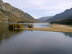 WS AERIAL View of lake sils / Isola, Upper Engadin, Switzerland Stock Footage