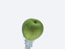 CU SLO MO Shot of Granny Smith Apple, malus domestica, Fruit entering Water against White Background / Calvados, Normandy, France Stock Footage