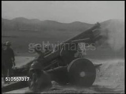 1950: KOREAN WAR: U.S. CANNONS: HA WS U.S. Soldiers firing cannons, Korea. WS Soldiers manning cannon, firing (frame skip). WS Cannons firing. WS Shells exploding on side of tree covered hill. Korean Conflict, Civil War, Cold War, Communist aggression Instructional Video