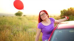 Hippie girl in the car on a journey Stock Footage