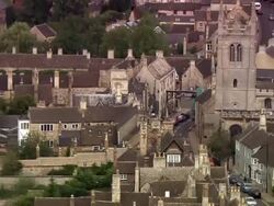Aerial close up The George coaching inn on Great North Road in Stamford / zoom out wide shot surrounding buildings Stock Footage