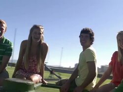 MS DS Students on spinning merry go round smiling / Cape Town, Western Cape, South Africa Stock Footage