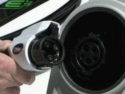 CU Charging port and connectors for Ford Motor Company electric car at Detroit Auto Show / Detroit, Michigan, USA Stock Footage