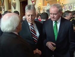 Republic of Ireland's President Michael D Higgins talks to Northern Irish First Minister Peter Robinson and Deputy First minister Martin McGuinness at Reception News Clip