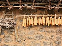 MS Shot of Jige(Korean A-Frame for carrying) and corn in Jeju Folk Village Museum / Jeju-do, South Korea Stock Footage
