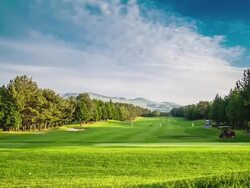 WS T/L PAN View of golf course with wide spread of prairie / Jeju, Jeju-do, South Korea  Stock Footage