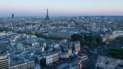 Elevated view of city with the Eiffel Tower in the  distance, Paris, France, Europe - Time lapse Stock Footage