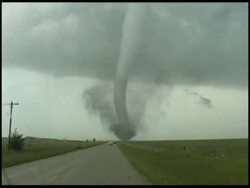 WA Track towards tornado moving across countryside, cars parked on road ahead, USA Stock Footage