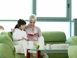 Happy family reading a book Stock Footage