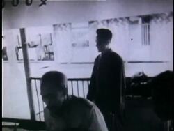 1956 B/W MONTAGE Ho Chi Minh in meeting with his top officials / North Vietnam Stock Footage