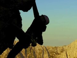 HD: Climbing On A Steep Rock Stock Footage