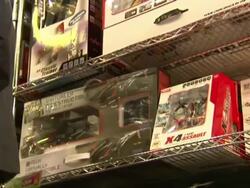 Remote-controlled helicopters and drones on display in Menkind store News Clip