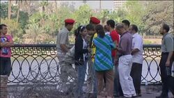 Aftermath of violence; morning shots; security, people gathered News Clip