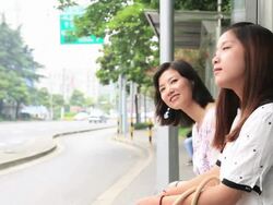 Young women using a smartphone in the train Stock Footage