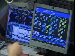Trading floor and analyst as oil prices hit $98 per barrel News Clip
