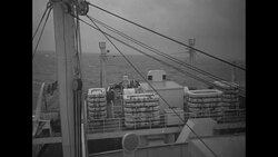 Crippled Liberty Ship SS Henry Ward Beecher is towed to Bermuda by SS Cecil N. Bean after troops it was carrying removed to ship USAT Saturnia News Clip