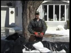 Red River breaches a dike, Sunday prayers News Clip