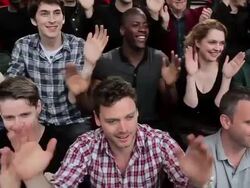 Football fans clapping in time with each other Stock Footage