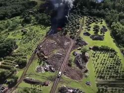 AERIAL: Homes In Pahoa, Hawaii Threatened By Lava Flow From Kilauea Volcano Stock Footage
