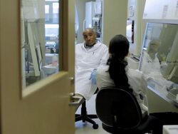 MS PAN Lab technicians discussing in Cancer research  Healthcare medicine Industry DNA sequencing Laboratory / Vancouver, BC, Canada    Stock Footage