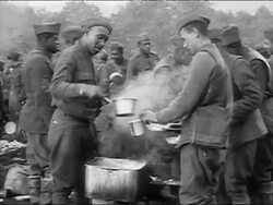 1910s black and white US soldiers of all-black troop in mess line / World War I / Europe Stock Footage