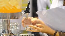 fast speed : orange juice in meeting hall Stock Footage