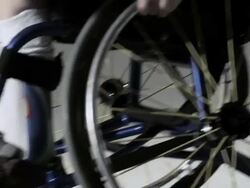 Boy playing wheelchair basketball Stock Footage