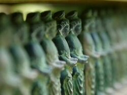   CU Shot of sunlight illuminating many Sho Kannon zo statue at Sanzen in Temple / Ohara, Kyoto, Japan Stock Footage