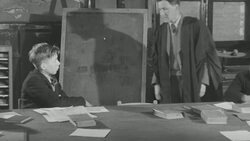 1947 MONTAGE Student getting in trouble with rubber band in classroom / United Kingdom Stock Footage
