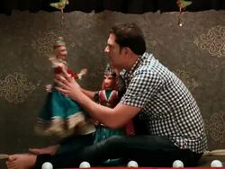 Mid adult man performing with puppets in a puppet show, Delhi, India Stock Footage