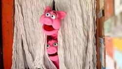 boy and young man playing hand puppet together Stock Footage