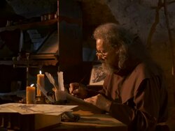 HD: Medieval Monk Scribing Calligraphy Book Stock Footage