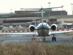 Aeroplane on Runway / Fumes & Pollution - HD & PAL Stock Footage