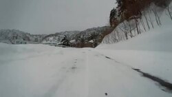 Snowy winter road drive -Mountain climbing- 4K - Stock Footage