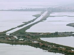 WS AERIAL View of highway on river at Carnon Plage / Languedoc Roussillon, France Stock Footage