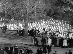 B/W 1963 horse-drawn wagon carrying JFK's coffin in procession in Arlington Cemetery / newsreel Stock Footage