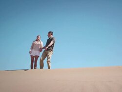 Couple in desert Stock Footage