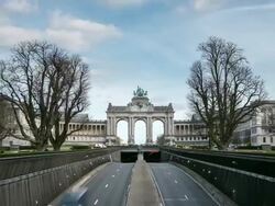 HD zoom in time-lapse: Triumphal Arch Cinquantenaire Parc Brussels Belgium Stock Footage