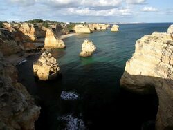 Sea coastal view of Praia Dos Caneiros, Ferragudo, Algarve, Portugal, Europe Stock Footage