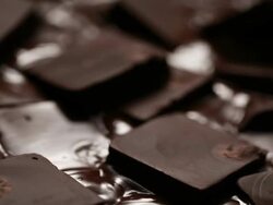 Melting chocolate blocks Stock Footage