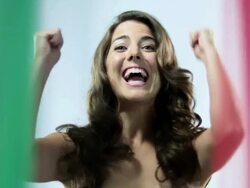 Woman clapping and cheering in front of Italian flag Stock Footage