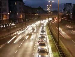 WS T/L View of motorway with heavy traffic in city at dusk /Cologne, North Rhine-Westphalia, Germany  Stock Footage