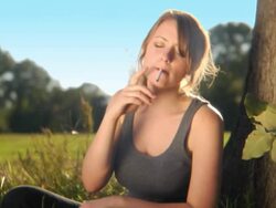 HD CRANE: Young woman smoking cigarette Stock Footage