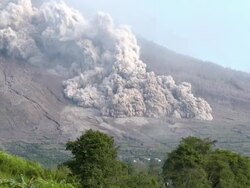 Sinabung Volcano Erupts Unleashing A Large Pyroclastic Flow Stock Footage